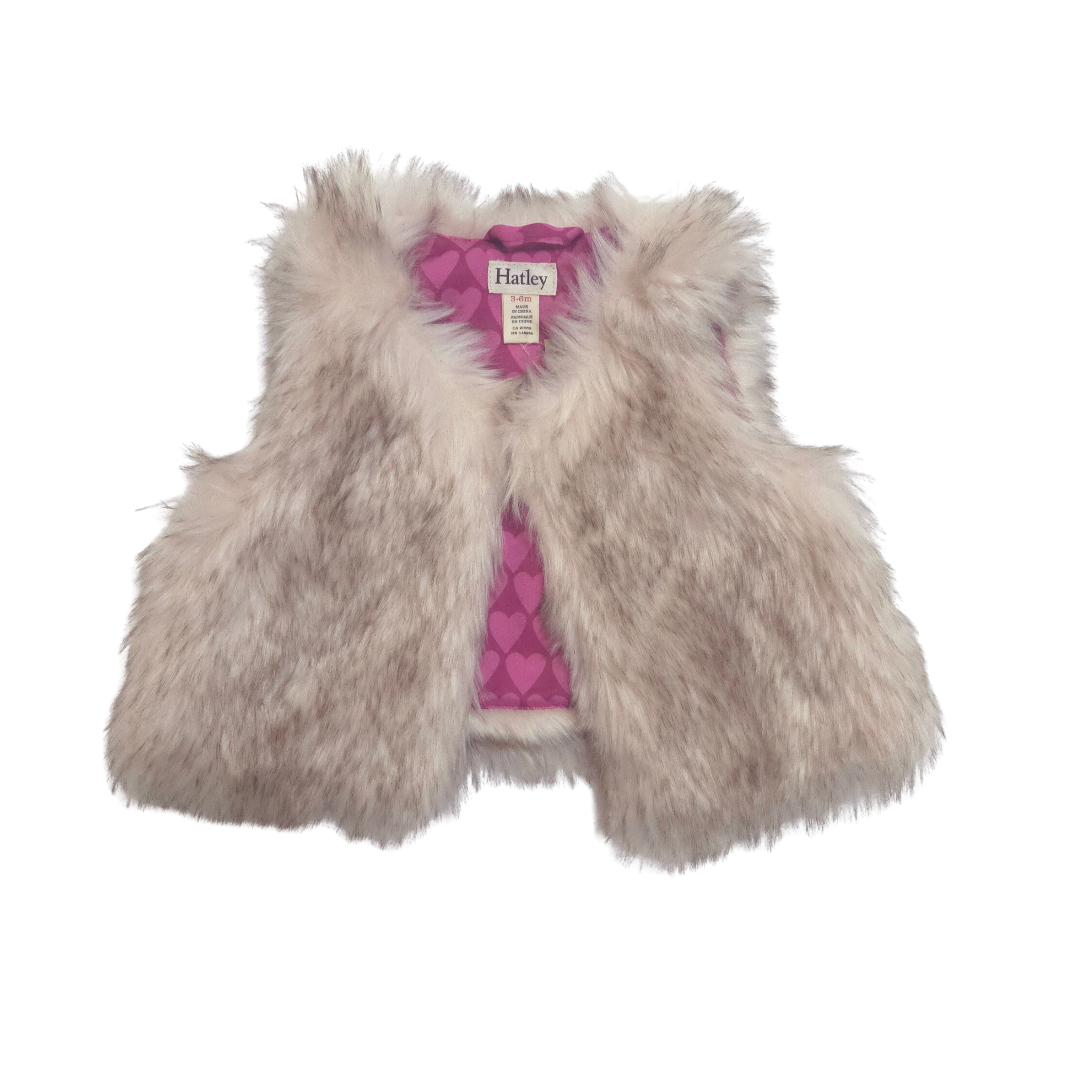 Children's fur vest with pink heart pattern