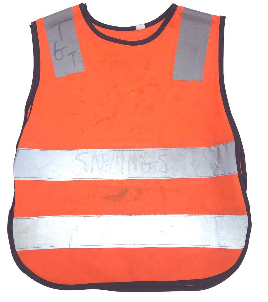 Orange safety vest with reflective stripes on a white background