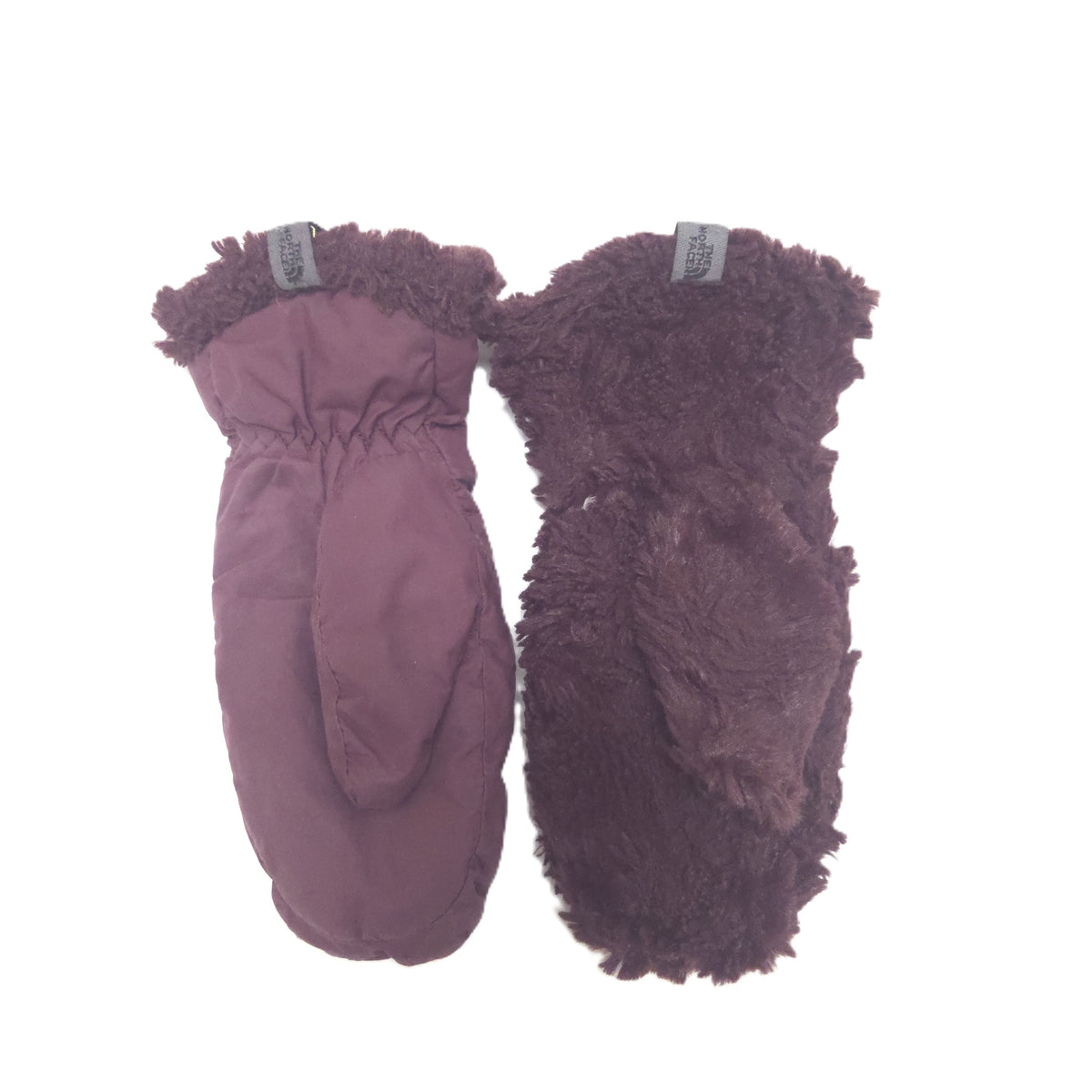 A pair of winter mittens shown flat against a white background, one mitten turn inside-out.