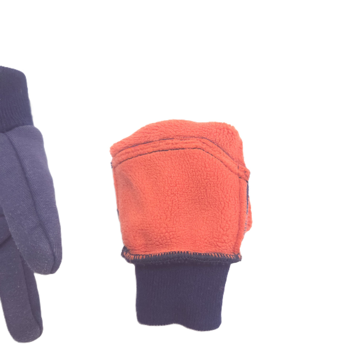 A close-up of a glove showing the inner fleece lining in orange and the ribbed cuff in dark navy blue, with another glove partially visible on the left.
