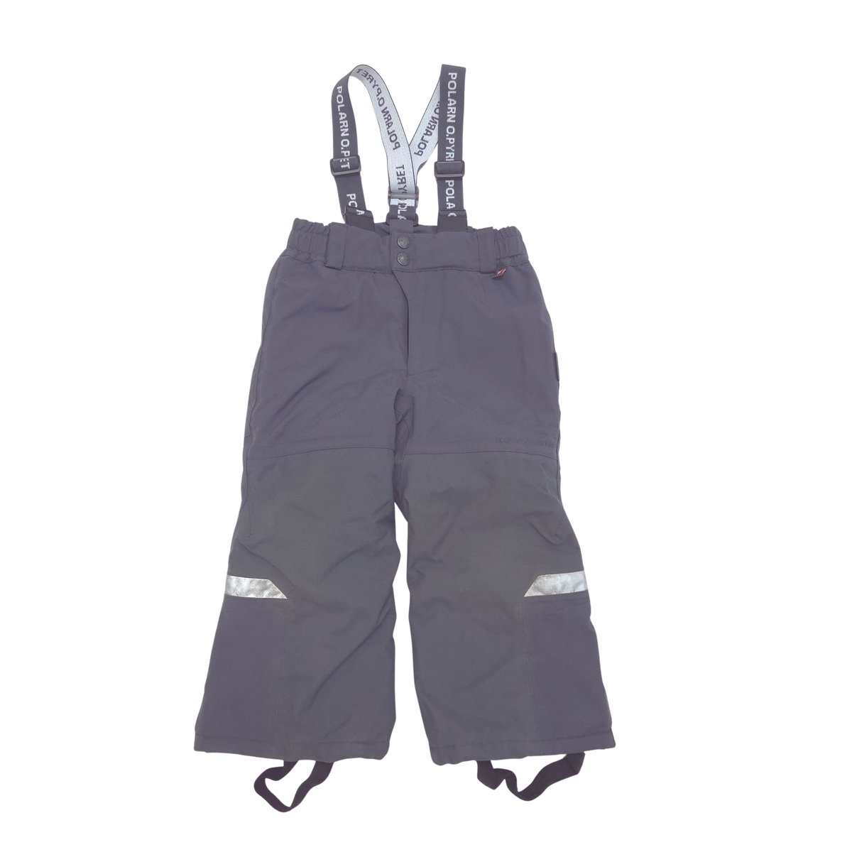A pair of dark gray child's snow pants with adjustable suspenders, featuring reflective silver stripes on the lower legs and boots straps at the ankles, shown against a plain white background.