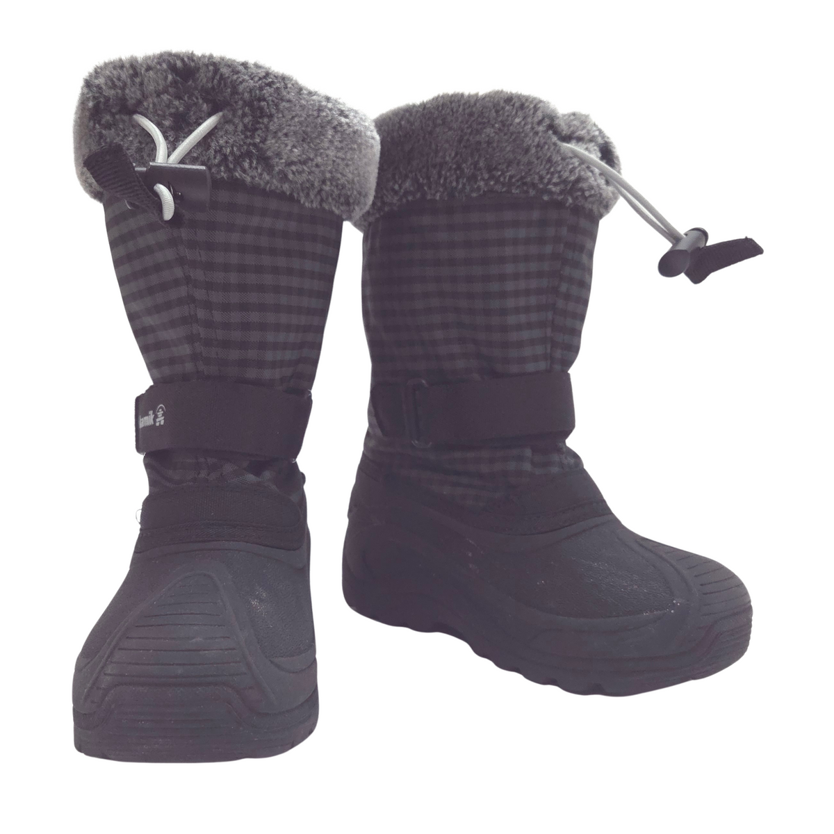 A pair of dark gray and black winter boots with a plaid pattern, gray faux-fur trim, and black straps, shown against a plain white background.
