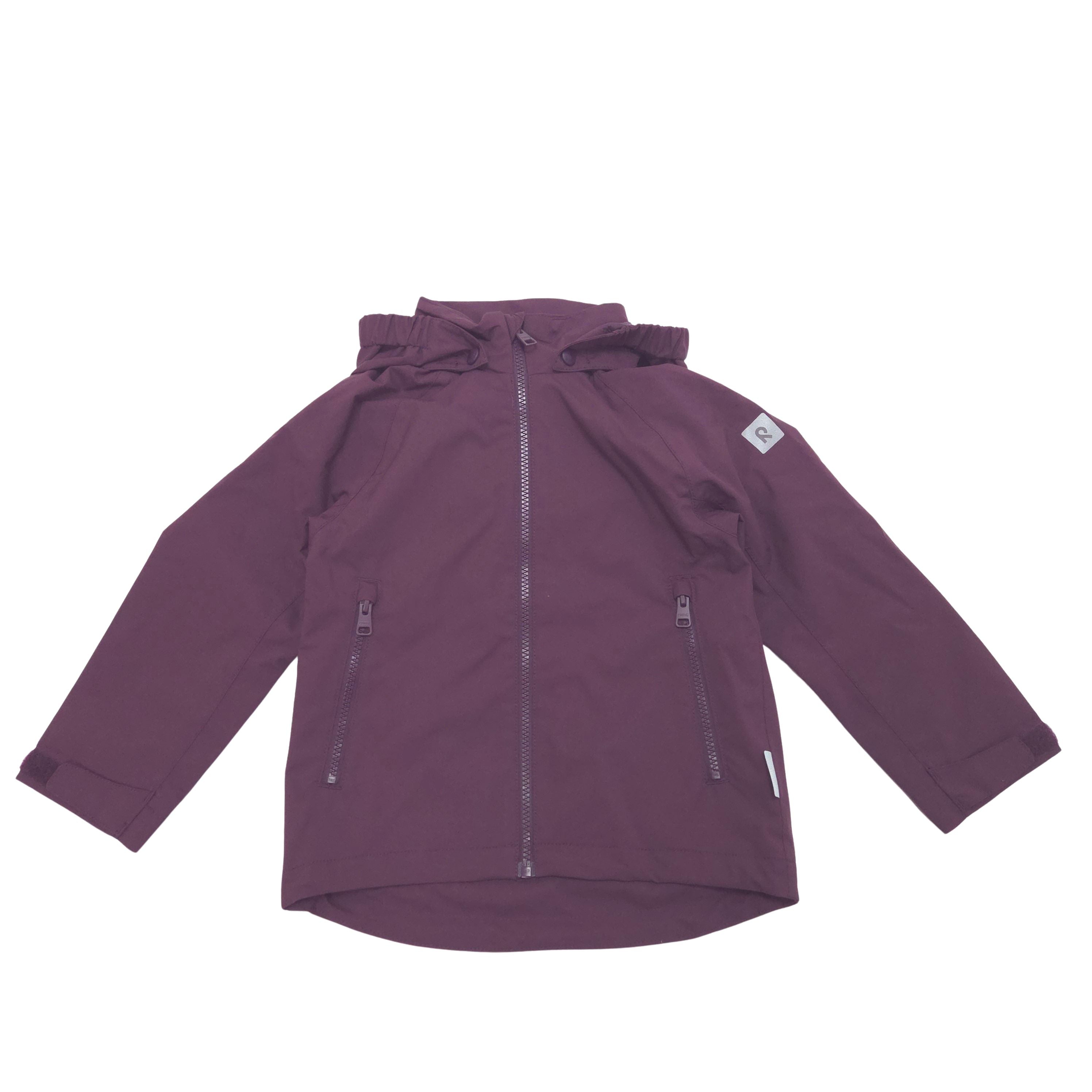 A dark plum purple hooded jacket with a front zipper, two vertical zippered pockets, and a small white brand patch on the left sleeve, shown flat on a white background.