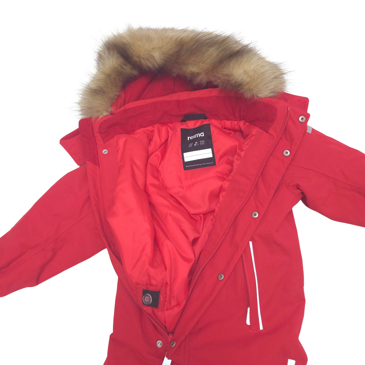 A red hooded winter snowsuit with a brown faux-fur trim around the hood, laid flat against a white background. The brand label 'reima' is visible inside the collar. Integrated waist adjuster with buttons make it easy to fine-tune the fit