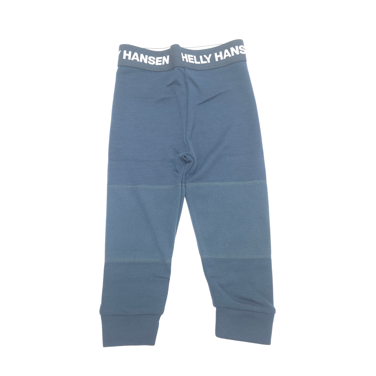 A pair of children's knit pants in a dusty slate blue color, featuring a contrasting dark gray elastic waistband with 'HELLY HANSEN' printed in white. The pants have a straight leg, ribbed ankle cuffs, and a central seam detail near the upper thigh. Fleece knee patches