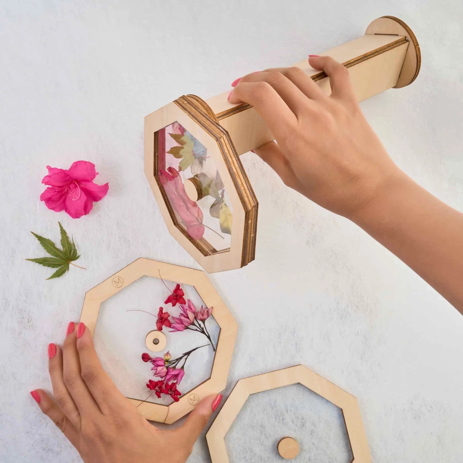 Eco-friendly wooden kaleidoscope project using real flowers and nature materials