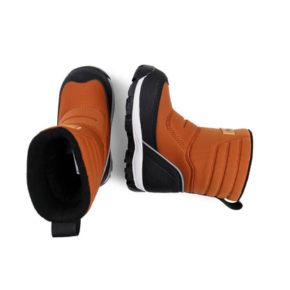 Pair of orange and black winter boots on a white background