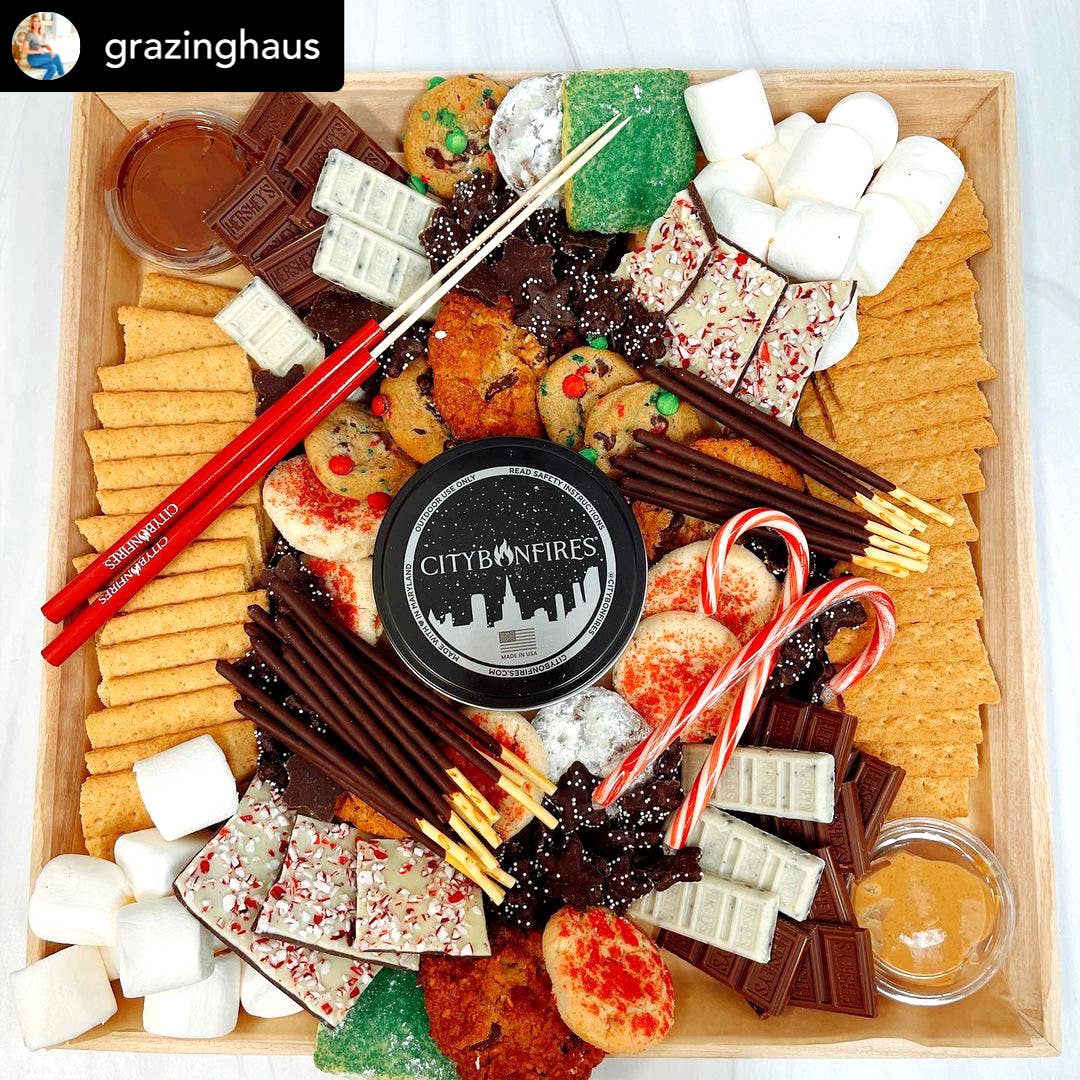 Grazing board with various snacks including cookies, crackers, and chocolate, with 'City Bonfires' branding.