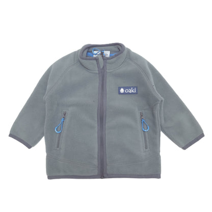 Gray fleece jacket with blue zippers on a white background