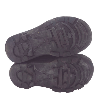 A pair of navy rubber shoe soles shown from the bottom against a plain white background.