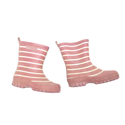 Pair of pink and white striped rain boots on a white background