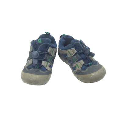 Pair of blue and gray children's shoes on a white background