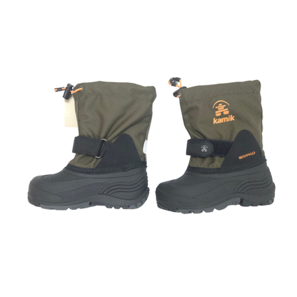 Pair of green and black Kamik boots on a white background