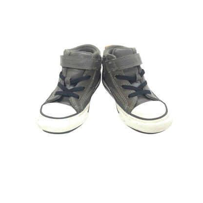 Pair of gray high-top sneakers with white soles on a white background