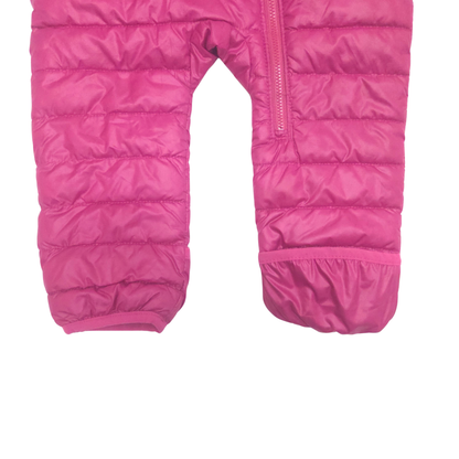 Pink puffer suit on a white background