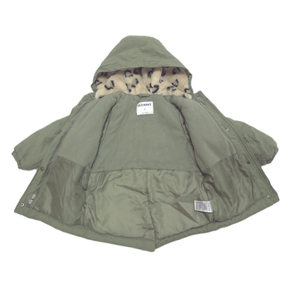 An olive green puffer jacket with a hood, featuring a patterned beige and black faux fur lining inside the hood. The jacket is laid flat against a white background.