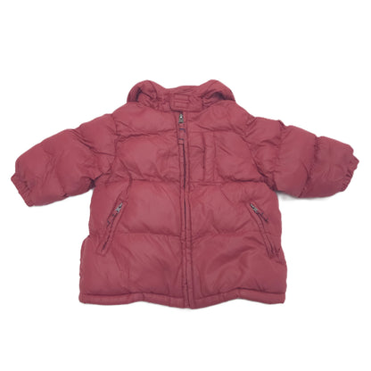 A red hooded puffer jacket shown from the front, laid flat against a solid white background.