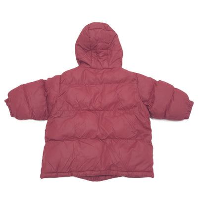 A red hooded puffer jacket shown from the back, laid flat against a solid white background.