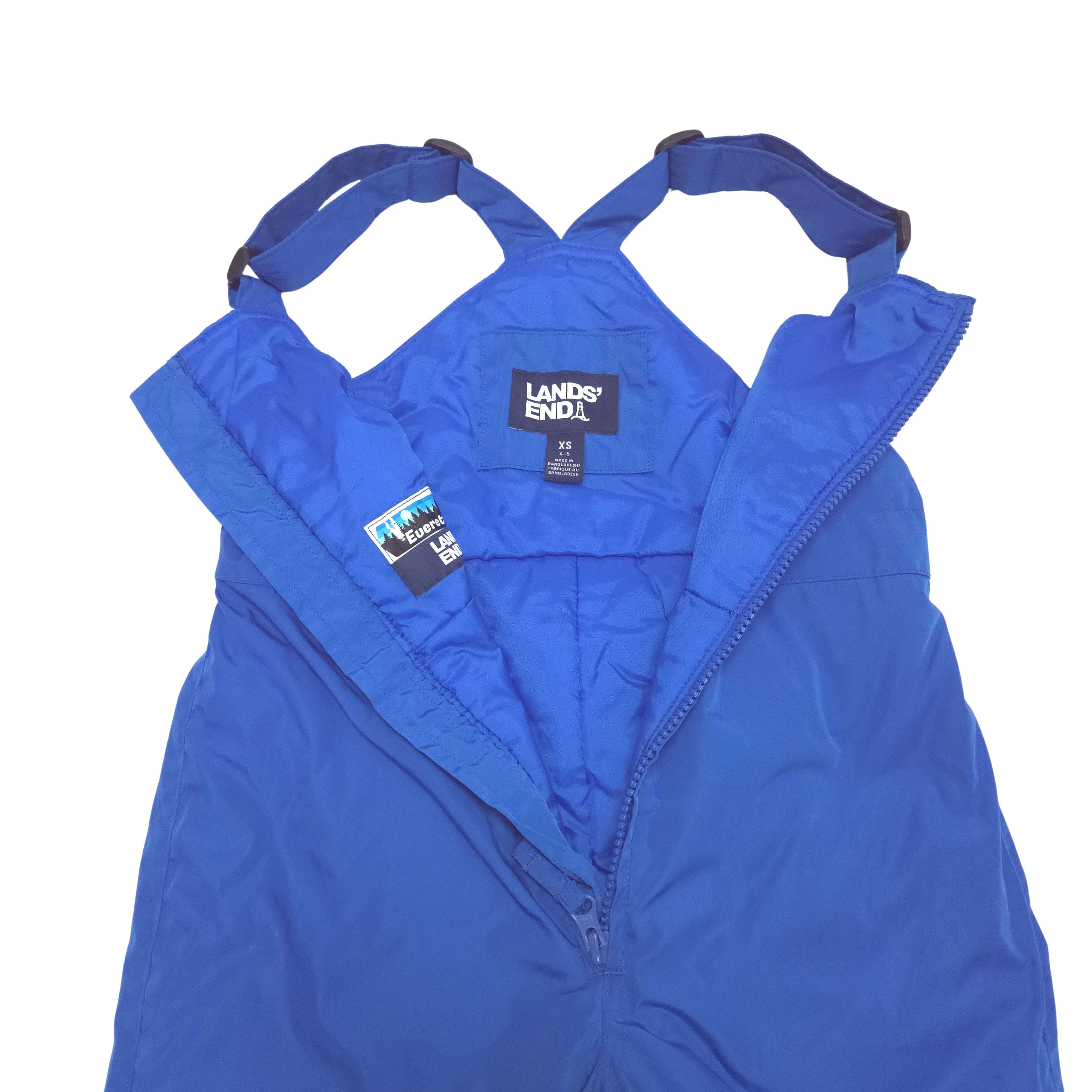 A blue snow bib pants with adjustable shoulder straps, laid flat against a white background open detail