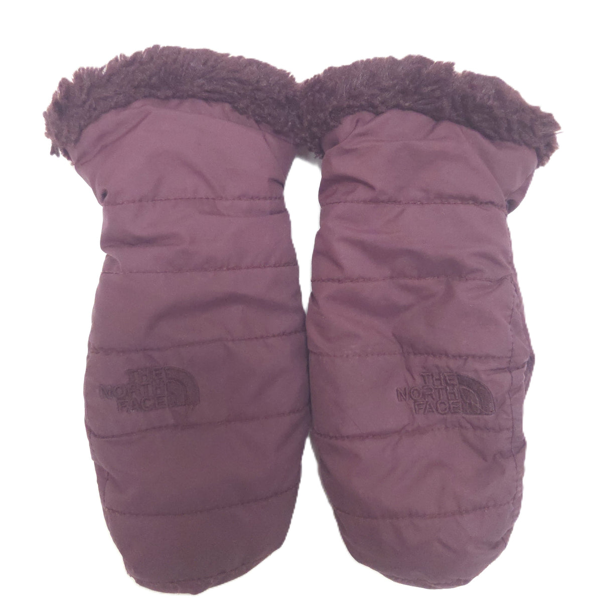 A pair of The North Face quilted winter mittens in a dusty mauve-purple color, featuring a dark brown faux-fur trim at the cuff and the brand's logo on the lower left of each mitten.