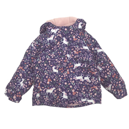A children's hooded winter jacket with a dark purple background covered in a whimsical print of white deer, foxes, and flowers, featuring a light pink lining visible inside the hood.