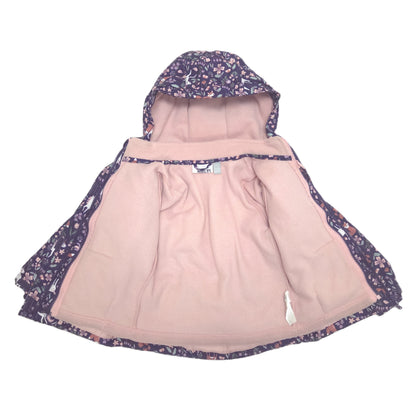 A hooded children's jacket in dusty pink fleece hoodie and a dark purple and pink floral patterned outer jacket