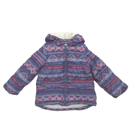 A hooded puffer winter jacket with a blue, pink, and purple geometric pattern, featuring a white fleece lining.