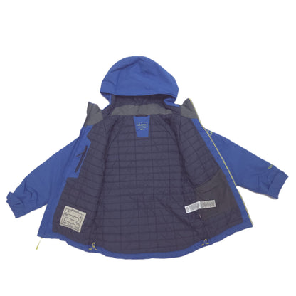 A hooded jacket shown laid flat against a white background, featuring a blue hood and sleeves, a dark navy quilted inner lining.