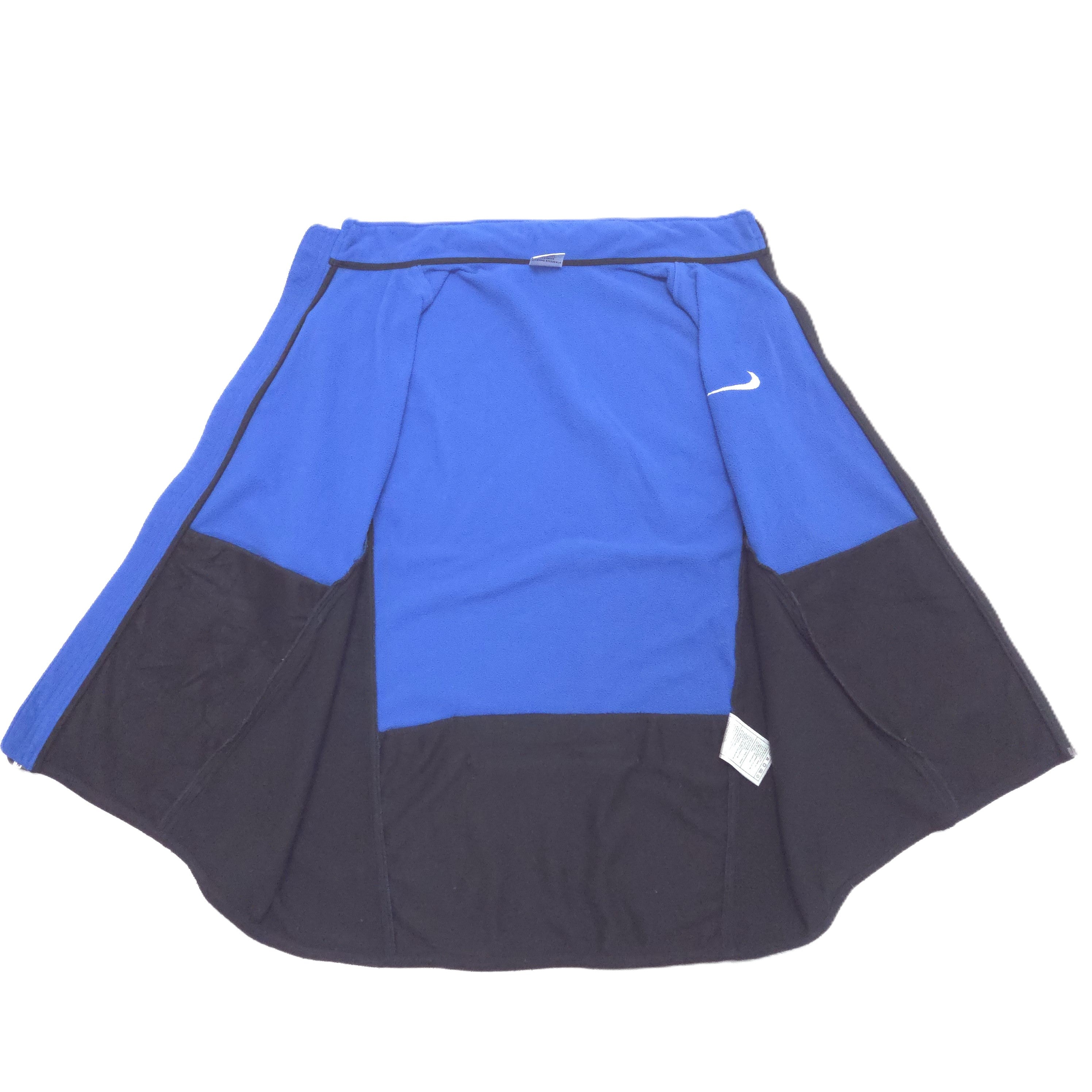 A Nike athletic vest in a color block design of royal blue and black open