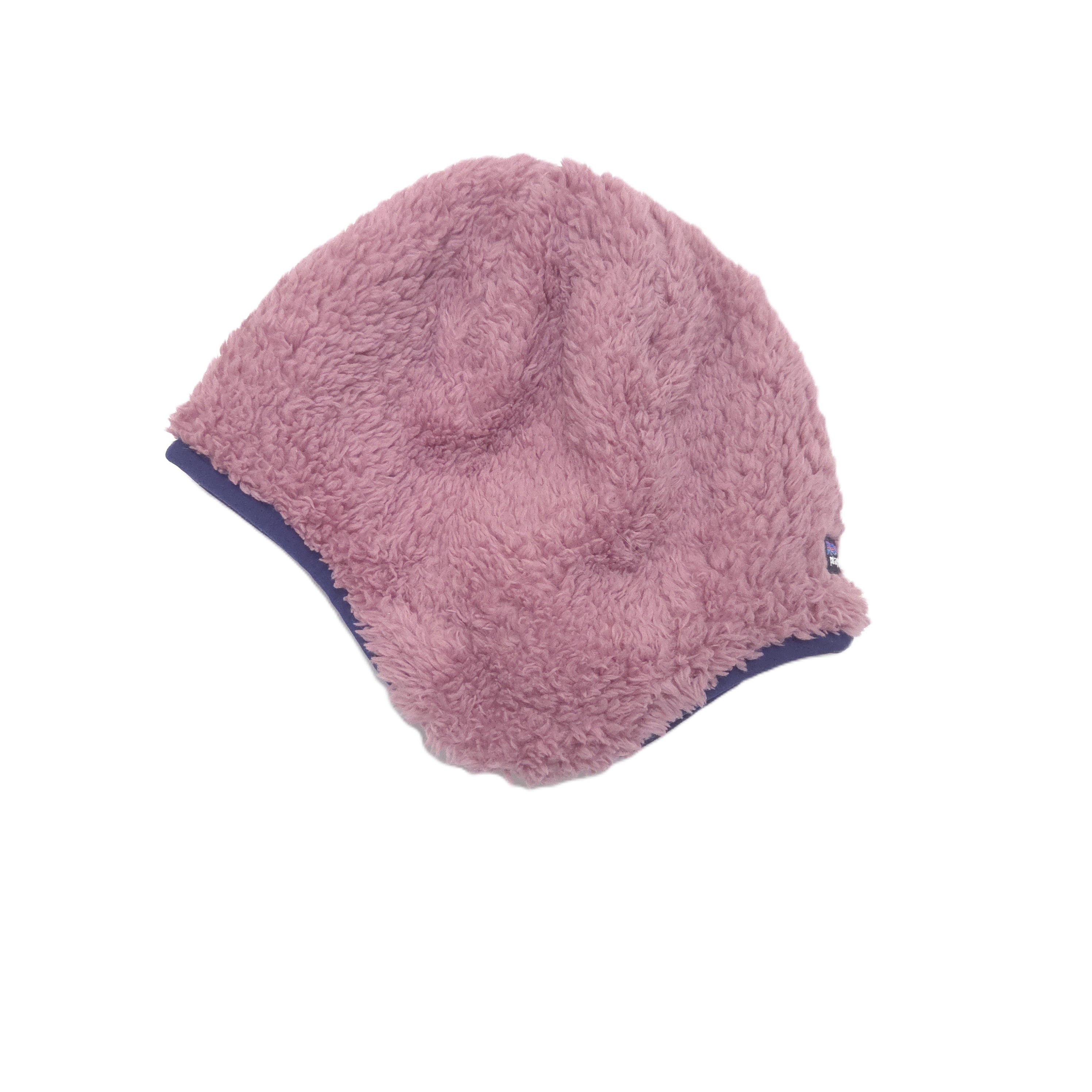 A reversible a pink fuzzy fleece beanie side image