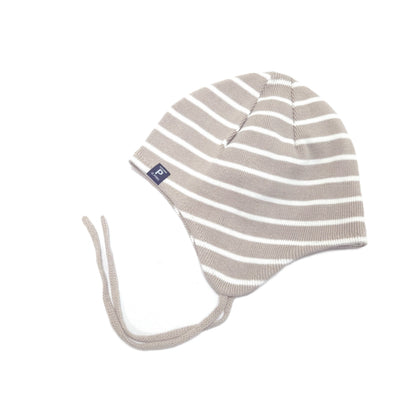 A knit baby beanie hat with horizontal taupe and white stripes, featuring ear flaps with long ties and a small navy brand tag on the side, shown against a plain white background.