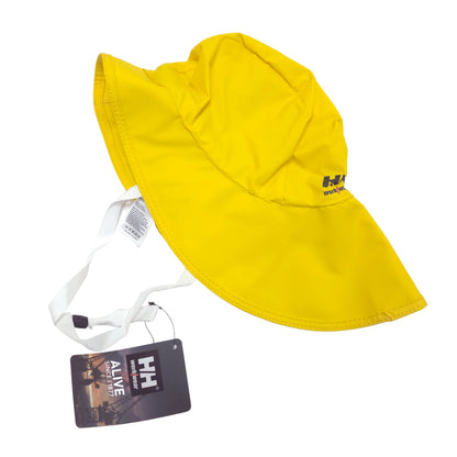 A bright yellow Helly Hansen rain hat with a white chin strap and a black Helly Hansen logo on the back, shown with its retail hangtag on a white background.