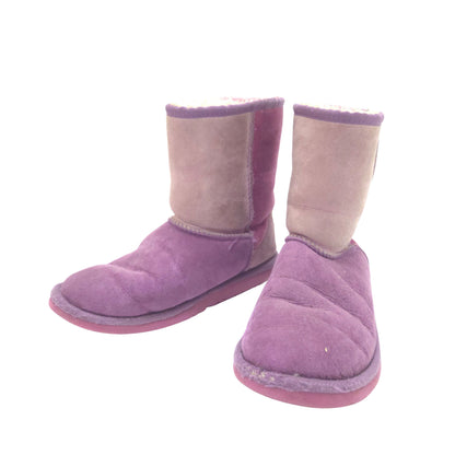 A pair of women's mid-calf boots in lavender purple suede with a light beige shearling-style collar and a pink sole, shown against a plain white background.