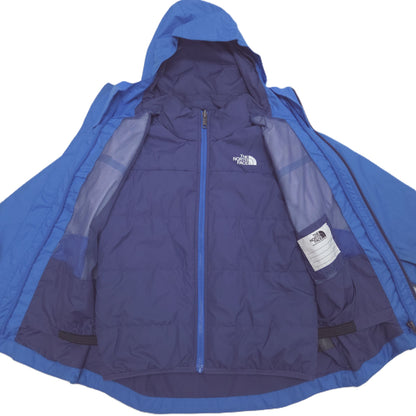 A blue and navy quilted 3in1 hooded jacket by The North Face, shown open against a white background to display the inner lining and mesh details.