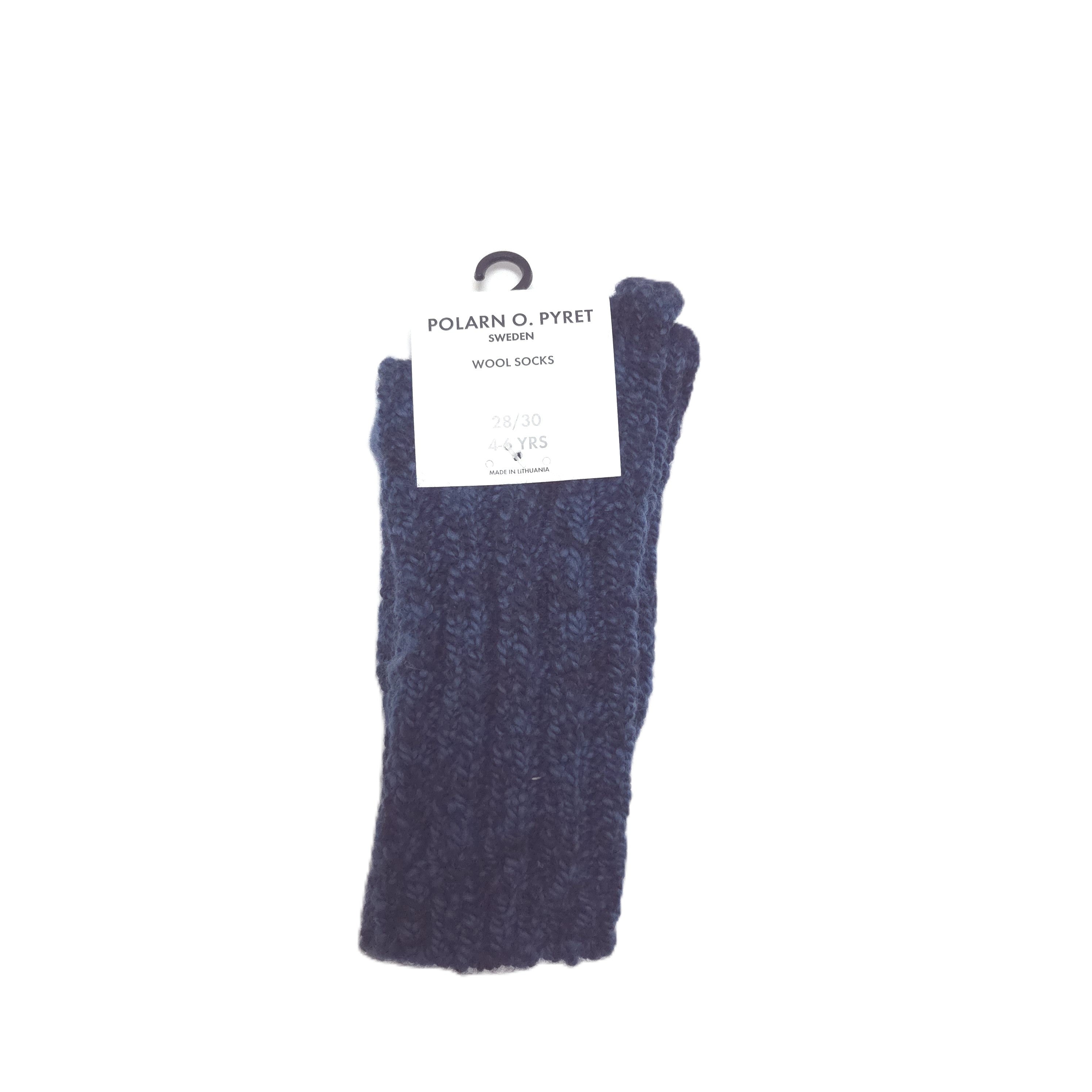 A dark navy blue ribbed knit wool socks with a white paper hangtag, shown against a plain white background.