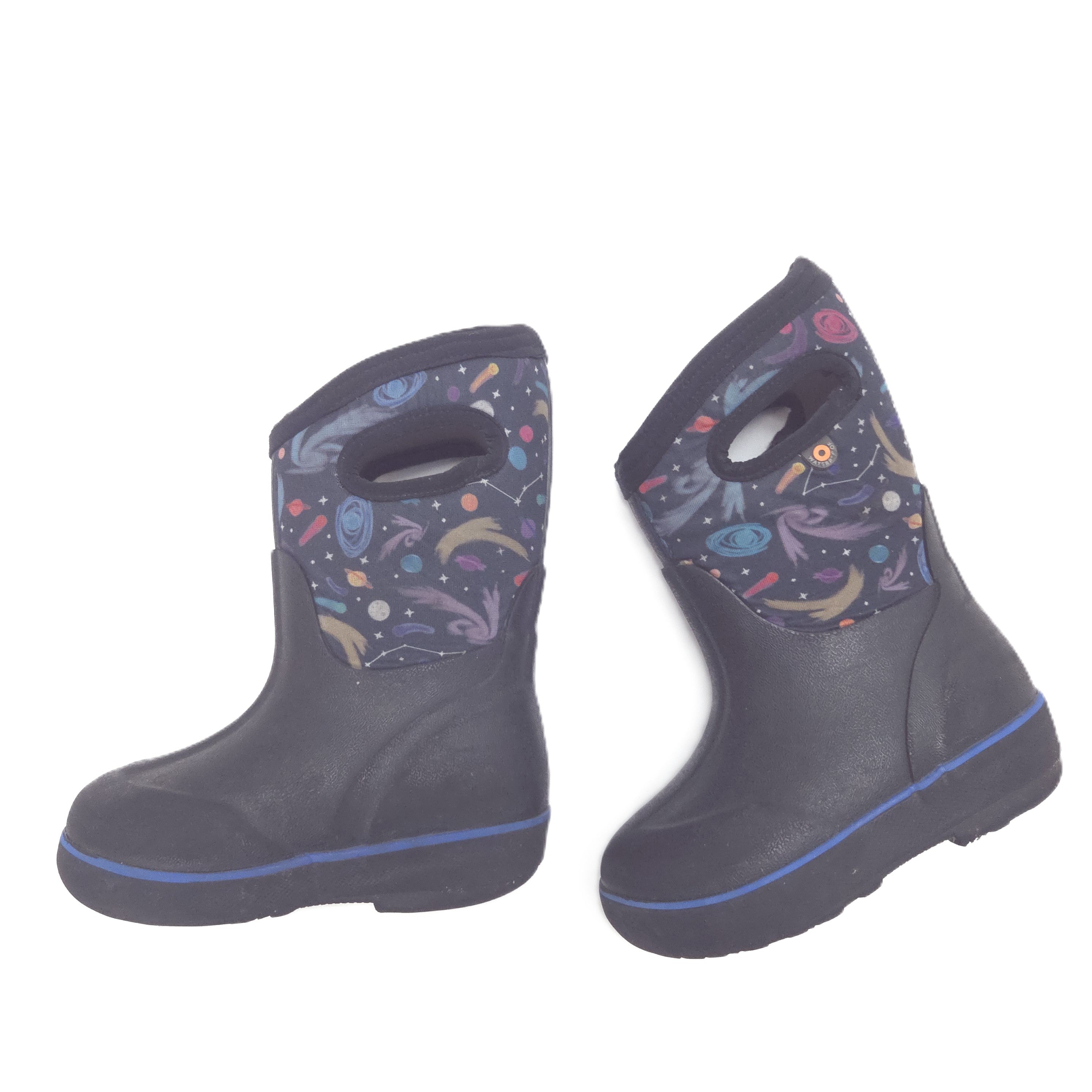 A pair of black children's rain boots with a colorful space-themed print on the pull tabs, shown against a plain white background.