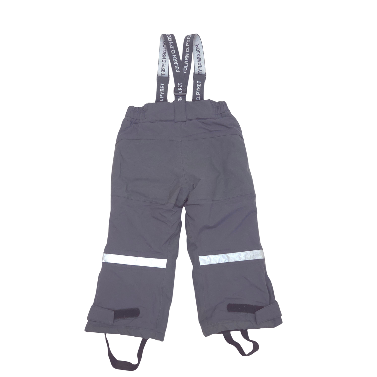 Dark gray snow pants with adjustable suspenders, featuring reflective silver stripes on the lower legs and leg warmers, shown against a plain white background.