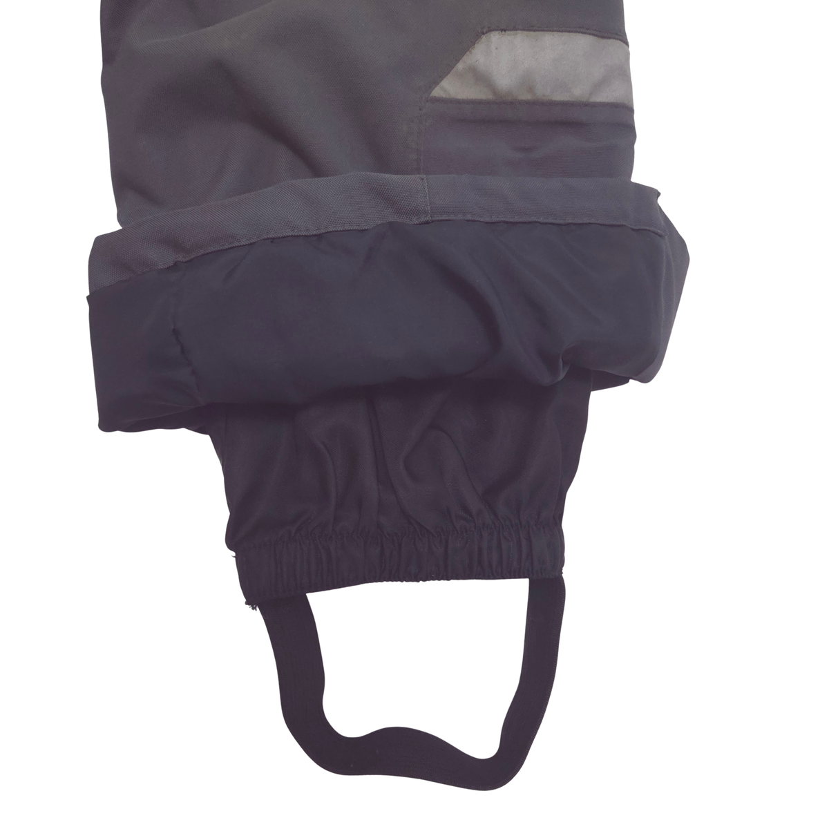 Internal gaiters at cuffs keep out snow; external scuff guards protect from boot- and ski-edge wear