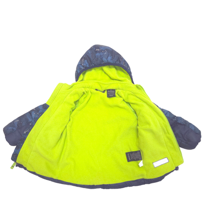 A high-visibility neon yellow fleece jacket from the inside, photographed on a plain white background.
