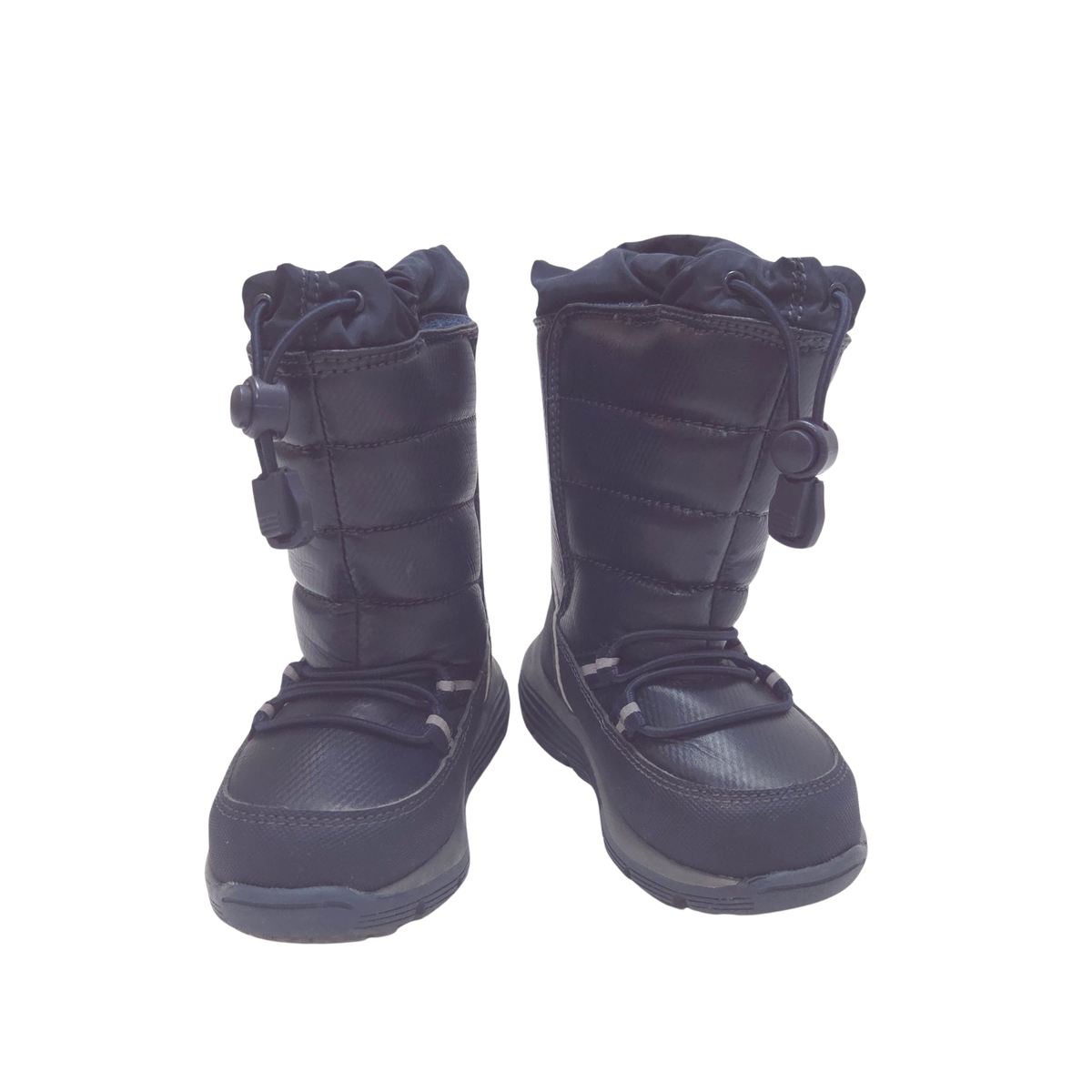A pair of navy winter boots with drawstring closures and buckle details, shown against a plain white background.