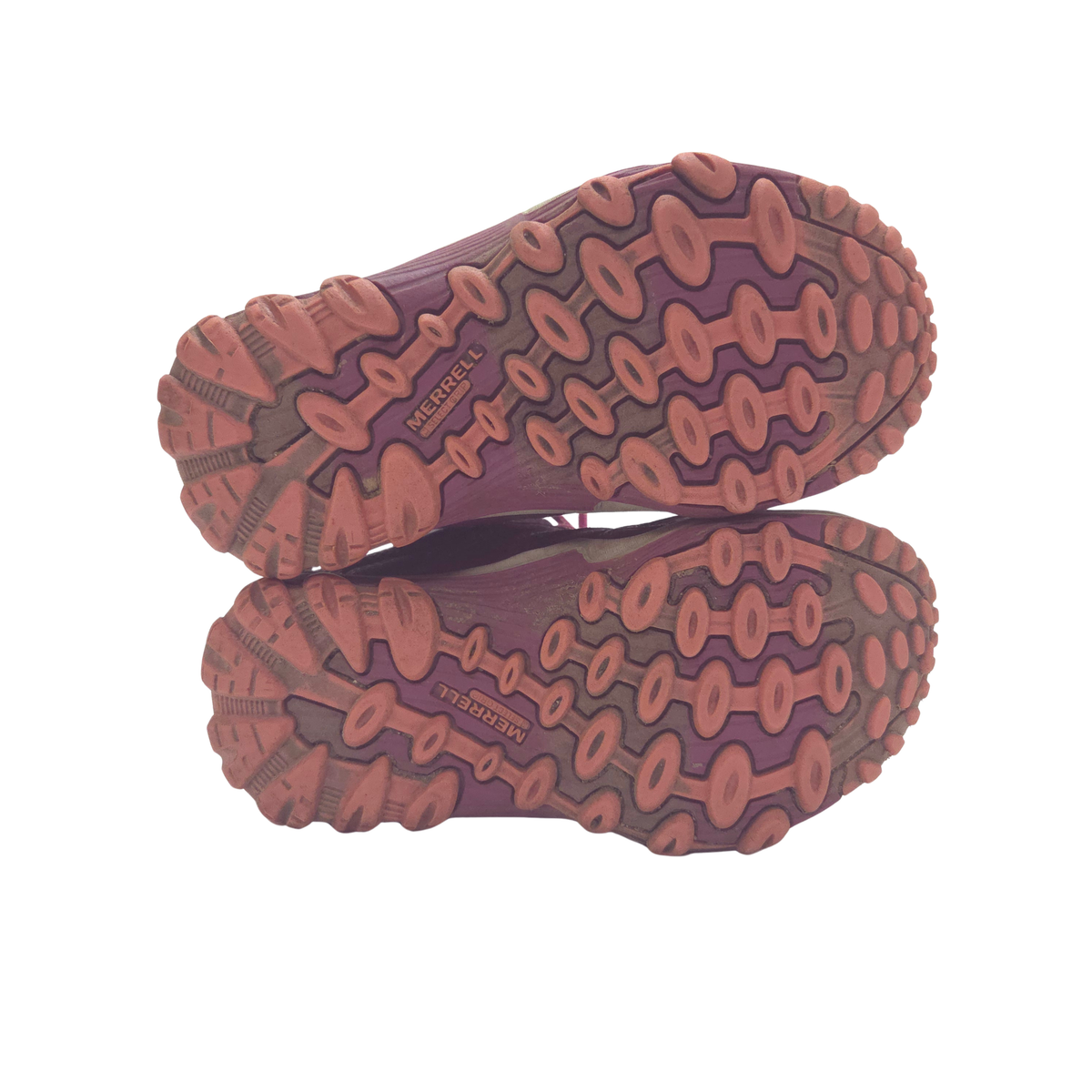 A pair of Merrell hiking boots shown from the sole, displaying the rugged tread pattern and brand name 'MERRELL' in gold lettering on a purple and reddish-brown outsole.