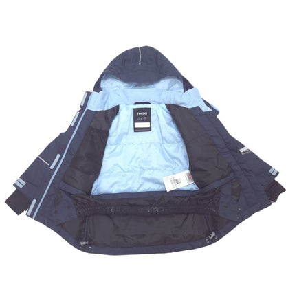A navy blue hooded winter jacket shown open, revealing a light blue interior lining. The jacket has reflective light blue stripes on the sleeves and a black brand label on the inner collar that reads 'novo'.
