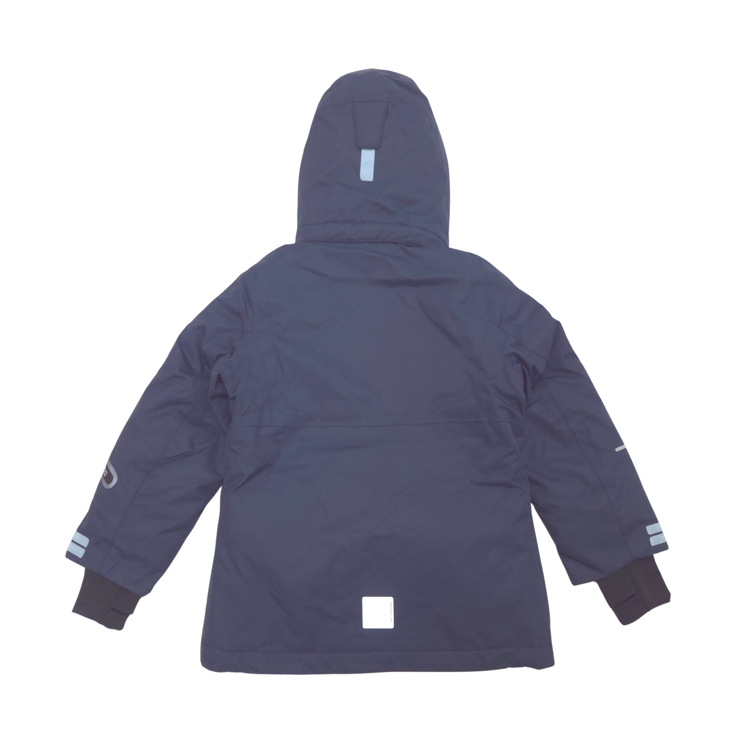 A dark navy blue hooded jacket shown from the back, featuring light blue reflective striping on the hood, cuffs, and back, and a small white square patch near the bottom hem.
