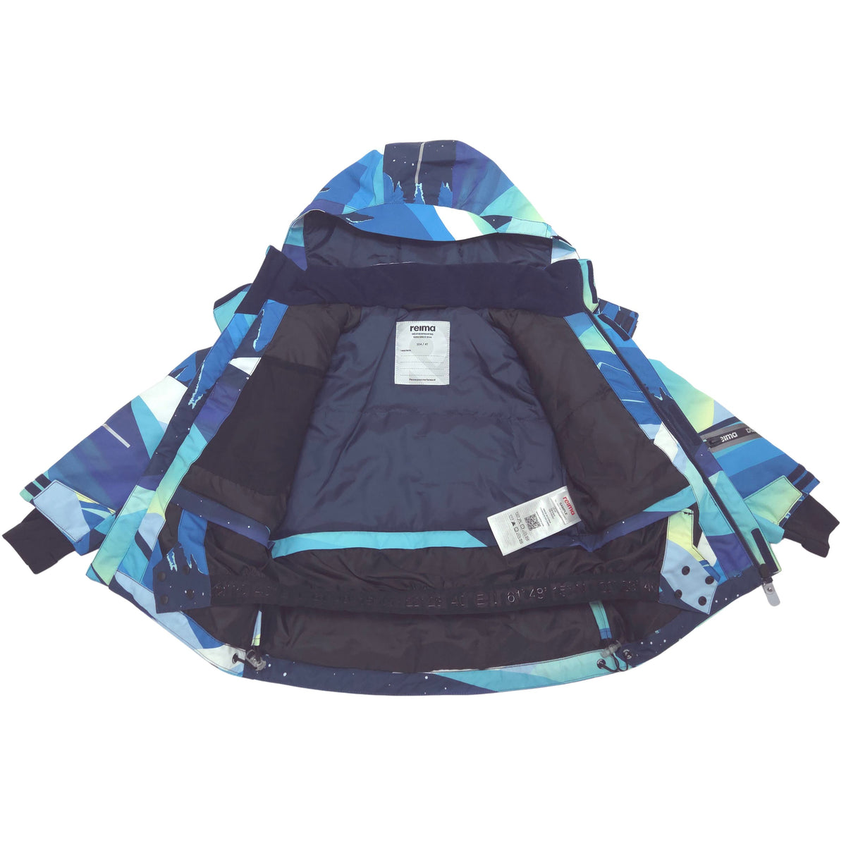 A children's hooded winter jacket shown open against a plain white background, displaying both the outer blue and teal geometric patterned shell and the dark navy interior lining.