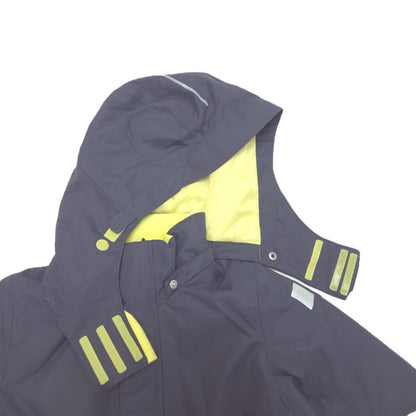 A close-up of a dark gray hooded ski jacket with bright yellow hook-and-loop fastener