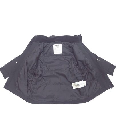 A black puffer jacket shown open, displaying its quilted interior lining and two white product tags, laid flat on a white background.