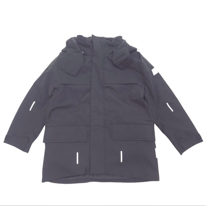 A black hooded jacket with multiple flap pockets and reflective white strip details, laid flat against a white background.