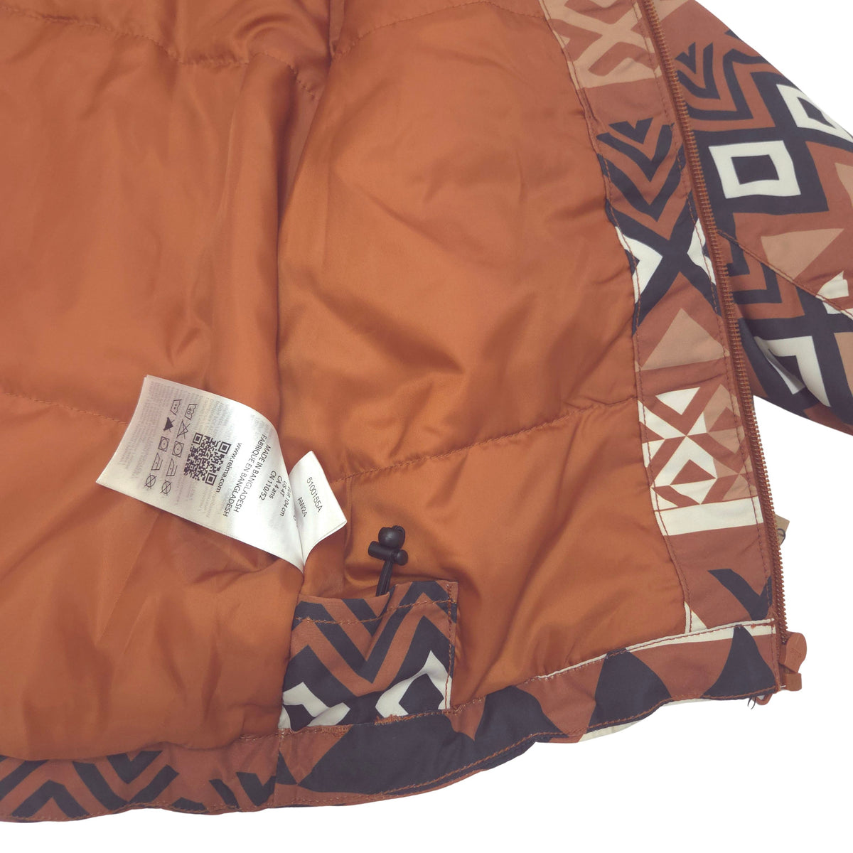 Dual drawcord hem adjustment