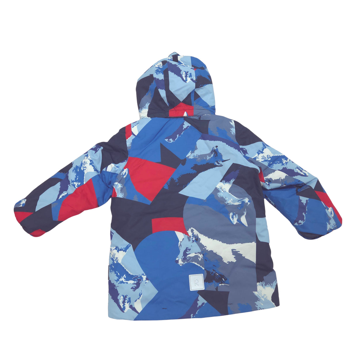 A hooded children's winter jacket shown from the back, featuring a bold geometric patchwork pattern in shades of blue, navy, red, and light gray on a plain white background.