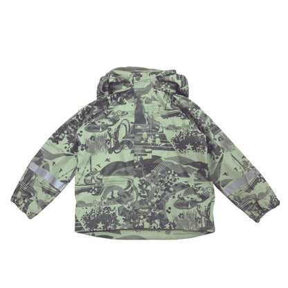 A hooded rain jacket with a light sage green base and a dark gray whimsical animal and landscape print, featuring reflective silver stripes on the sleeves, shown against a plain white background.